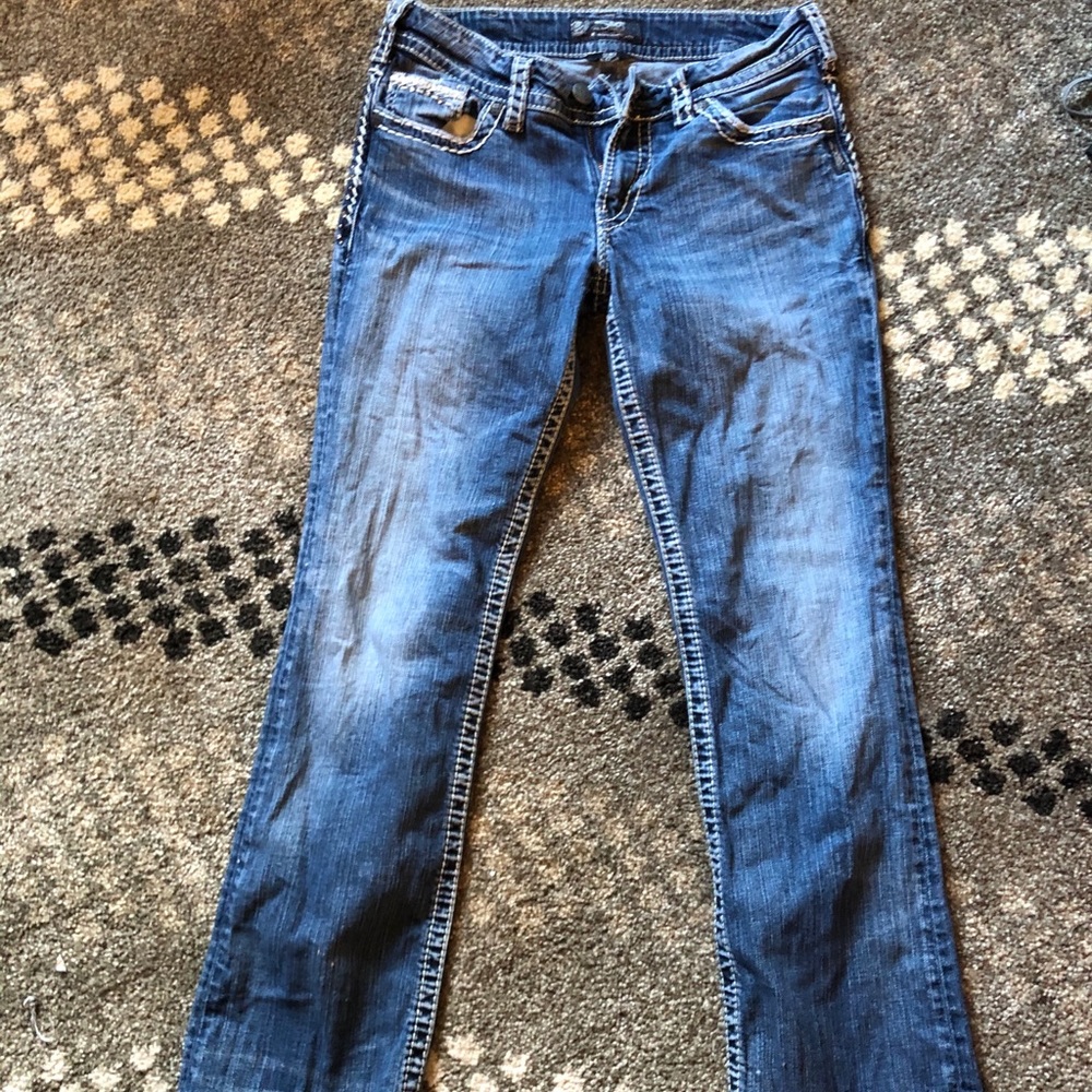 Silver jeans.